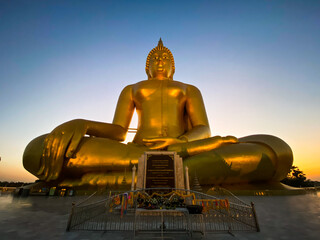 Big Buddha during sunset at Wat Muang in Ang Thong, Thailand