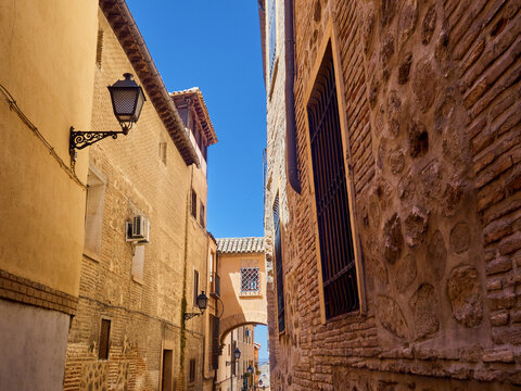Arch in Angel street, a charming narrow street in Toledo, Castilla La Mancha, Spain
