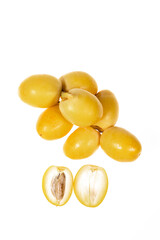 yellow raw dates isolated on white background