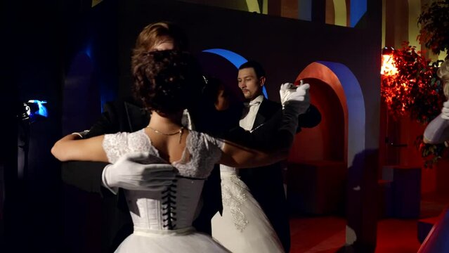 waltzing people in ballroom, amazing royal ball in palace, fairytale and dream, beautiful women