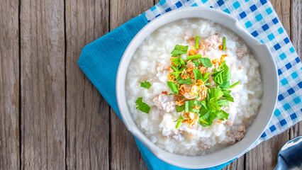 Breakfast rice porridge on a wooden table