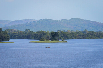 Obraz premium Amazing Natural Landscapes of Ghana Atlantic Ocean Coastline with Green Forest and Blue Water, West Africa