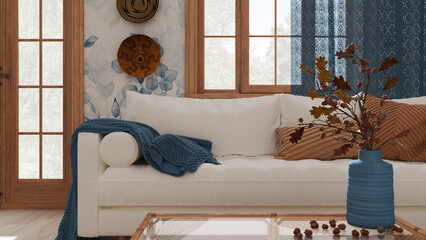 Vintage living room in white and blue tones closeup. Sofa, rattan table with autumn decors. vase with dry leaves and acorns. Boho chic design, fall interior concept © ArchiVIZ