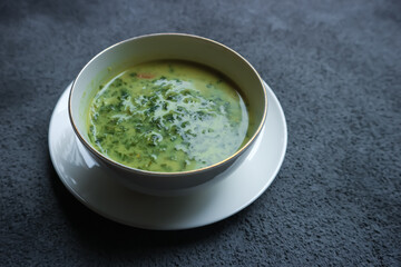 mashed cassava leaf vegetables in a bowl