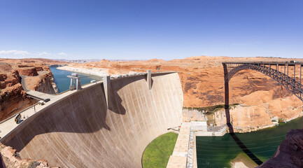 Glen Canyon Dam and Colorado River in Page, Arizona, United States of America. American Mountain Nature Landscape Background. Sunny Blue Sky Day. Panorama