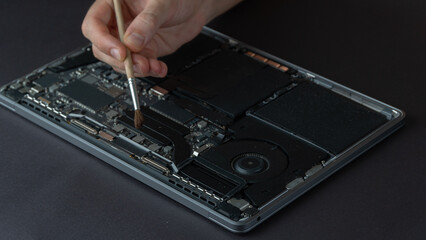 Removal of dust from the laptop, repair and maintenance of computer equipment