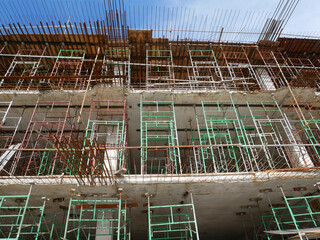 SELANGOR, MALAYSIA -JULY 4, 2021: Scaffolding is installed as temporary support for concrete formwork at the construction site. Installed according to the design approved by the engineer.