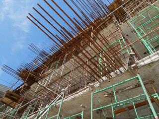 SELANGOR, MALAYSIA -JULY 4, 2021: Scaffolding is installed as temporary support for concrete formwork at the construction site. Installed according to the design approved by the engineer.