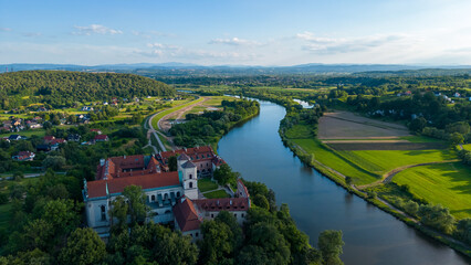 Aerial view of Benedictine Abbey on the rocky hill and Vistula River in Tyniec, near Krakow, Poland 