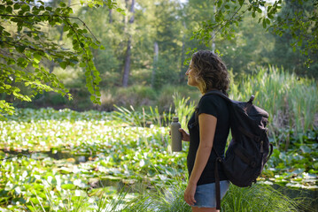 caucasian woman hiking in french forest