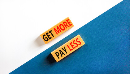 Get more pay less symbol. Concept words Get more pay less on wooden blocks on a beautiful white and...