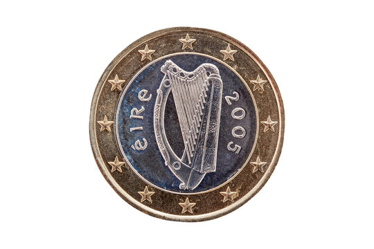 One Euro coin of Ireland (Eire) dated 2005 which shows the Irish Celtic harp on the reverse cut out and isolated on a white background, stock photo image