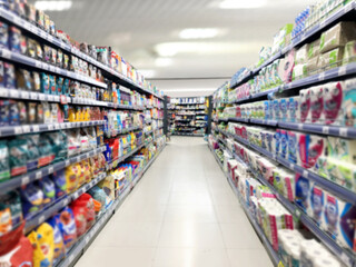 Choosing a dairy products at supermarket.Grocery stores .blurred background