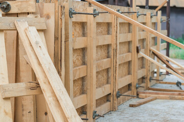 Wooden formwork for pouring concrete from OSB plywood - obrazy, fototapety, plakaty