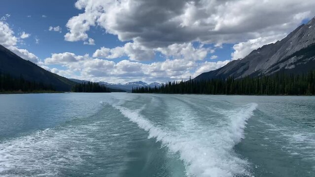 Wake of a boat leaving Spirit Island on Maligne Lake in Jasper National Park Alberta Canada