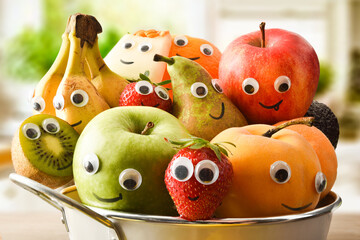 Detail of a fruit bowl full of fruit with eyes