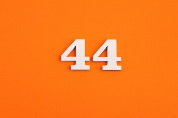 Number 44 - On orange foam rubber background