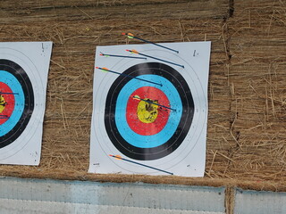 An archery target used at a school archery range in New Taipei City with six arrows stuck on it.