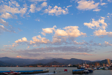 Beautiful sunset and small ships in Batumi sea port © vahanabrahamyan