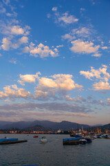 Beautiful sunset and small ships in Batumi sea port