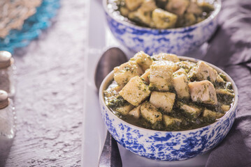 Arabic Cuisine; Egyptian traditional Colcass Stew (Taro in cilantro and chard stew). Colcass is a popular stew made in Egypt during the winter months. Close up with copy space.
