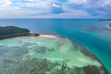 Fototapeta premium Aerial view of Thong Sala pier, boat and koh Tae Nai in koh Phangan, Thailand