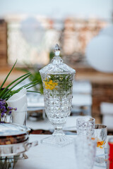 Served party table on white background. Atmosphere of celebration.