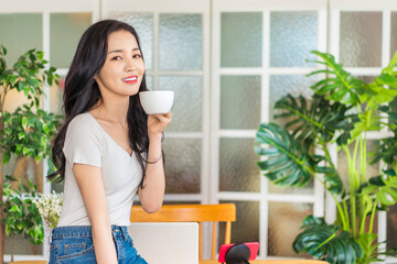 woman holding a cup of coffee