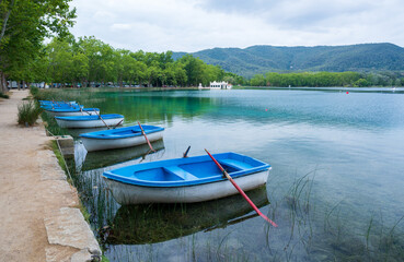 Naklejka na ściany i meble Landscape with boats in the lake of Banyoles, Spain