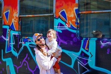 father in love with his child in varna bulgaria  - obrazy, fototapety, plakaty