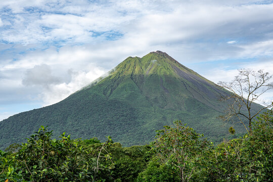 Costa Rica, The Volcano Arenal surrounded by the tropical forest 