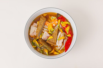 Bun mam, Vietnamese rice noodle soup with shrimp fish paste, Vietnamese food isolated on white background, top view