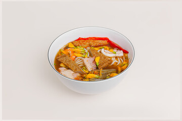 Bun mam, Vietnamese rice noodle soup with shrimp fish paste, Vietnamese food isolated on white background, perspective view