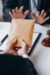 Individuals are giving bribes to officials in order to commit corruption in lawsuits, illegal...