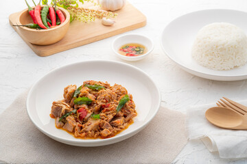 Stir Fried Canned Tuna with Thai Basil in white plate.asian spicy food