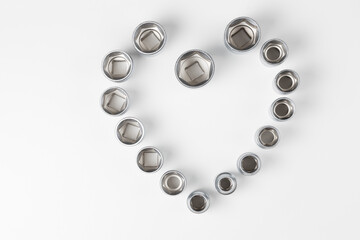  Hexagonal nests of different sizes in the shape of a heart on a white surface