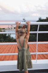 Fototapeta na wymiar little girl in a dress in madeira portugal 