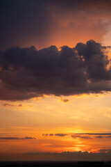 Orange sky at sunset after rain in Kazakhstan. High quality photo
