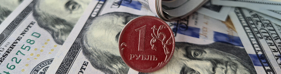 Exchange of Russian ruble for US dollar closeup