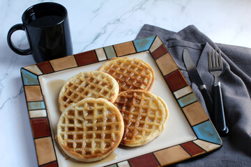 Waffles, with butter and syrup, and coffee make a nice brunch