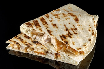 Crunch with mozzarella, camembert. Isolated on black background. street food.