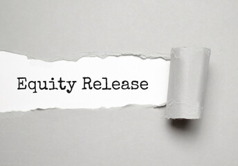 Equity Release text on white torn paper