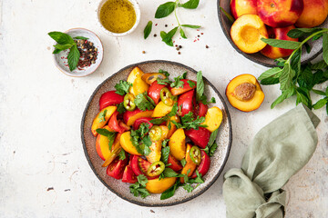 Fresh spicy salad with tomatoes and nectarines	