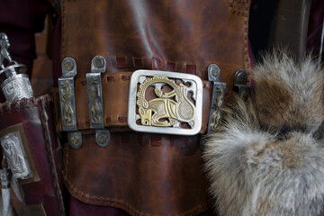 Close up view of Scythian leather belt on armor