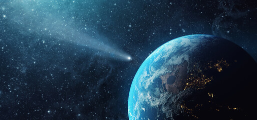Obraz na płótnie Canvas Comet, asteroid, meteorite flying to the planet Earth. Glowing asteroid and tail of a falling comet threatening the safety of the Earth. Elements of this image furnished by NASA.