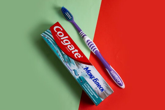 May 22, 2022 Ukraine city Kyiv Colgate toothpaste on a colored background