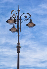 European street lamppost surround by sky