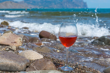Glass of wine by the sea