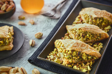 Arabic Cuisine; Traditional Arabic Dessert "Warbat" or "Shaabiyat" It is an Arabic sweet pastry similar to Baklava. It consisting of layers phyllo dough filled with crushed pistachios.