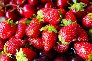 strawberries and cherries. healthy and delicious dessert.